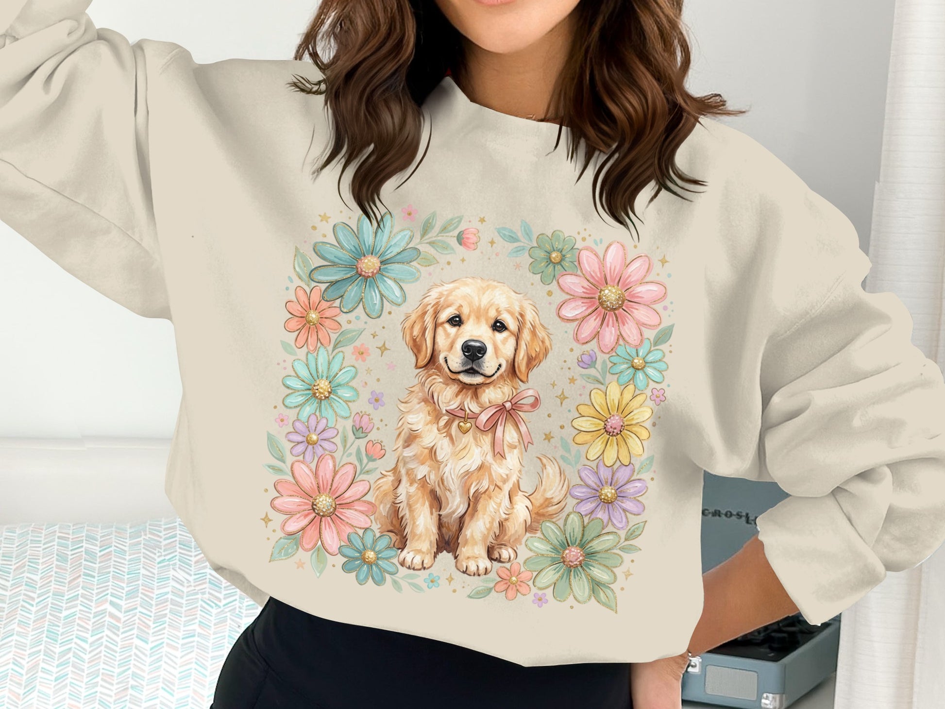 Golden retriever puppy surrounded by pastel flowers on a crewneck sweatshirt.