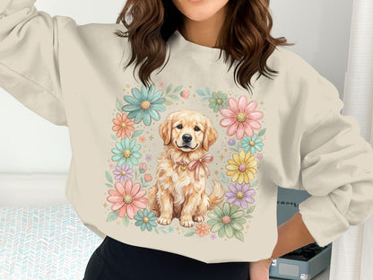 Golden retriever puppy surrounded by pastel flowers on a crewneck sweatshirt.