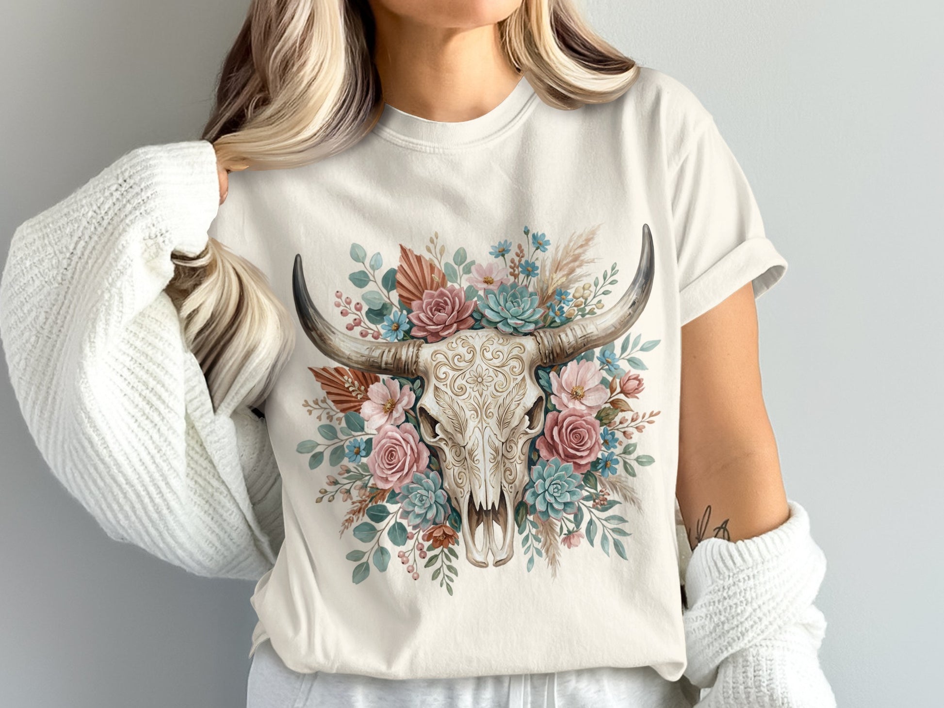 Cream t-shirt with steer skull and floral succulent design.