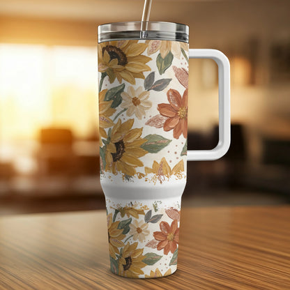 30-ounce tumbler with a floral sunflower design and white handle.