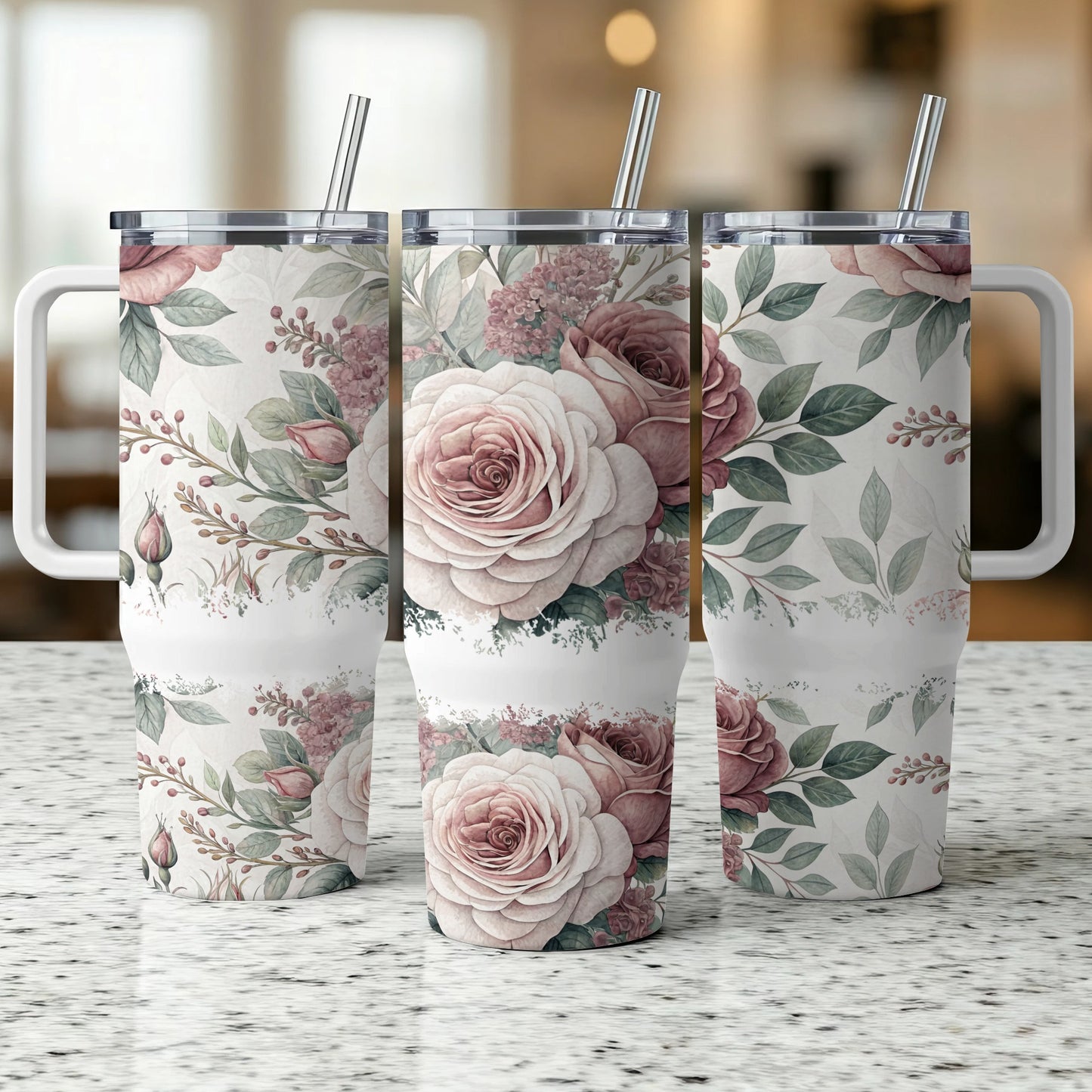 Three tumblers with a floral pattern of pink roses and green leaves.