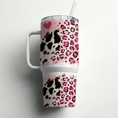 Tumbler with pink leopard print and black splatter, white handle and straw.