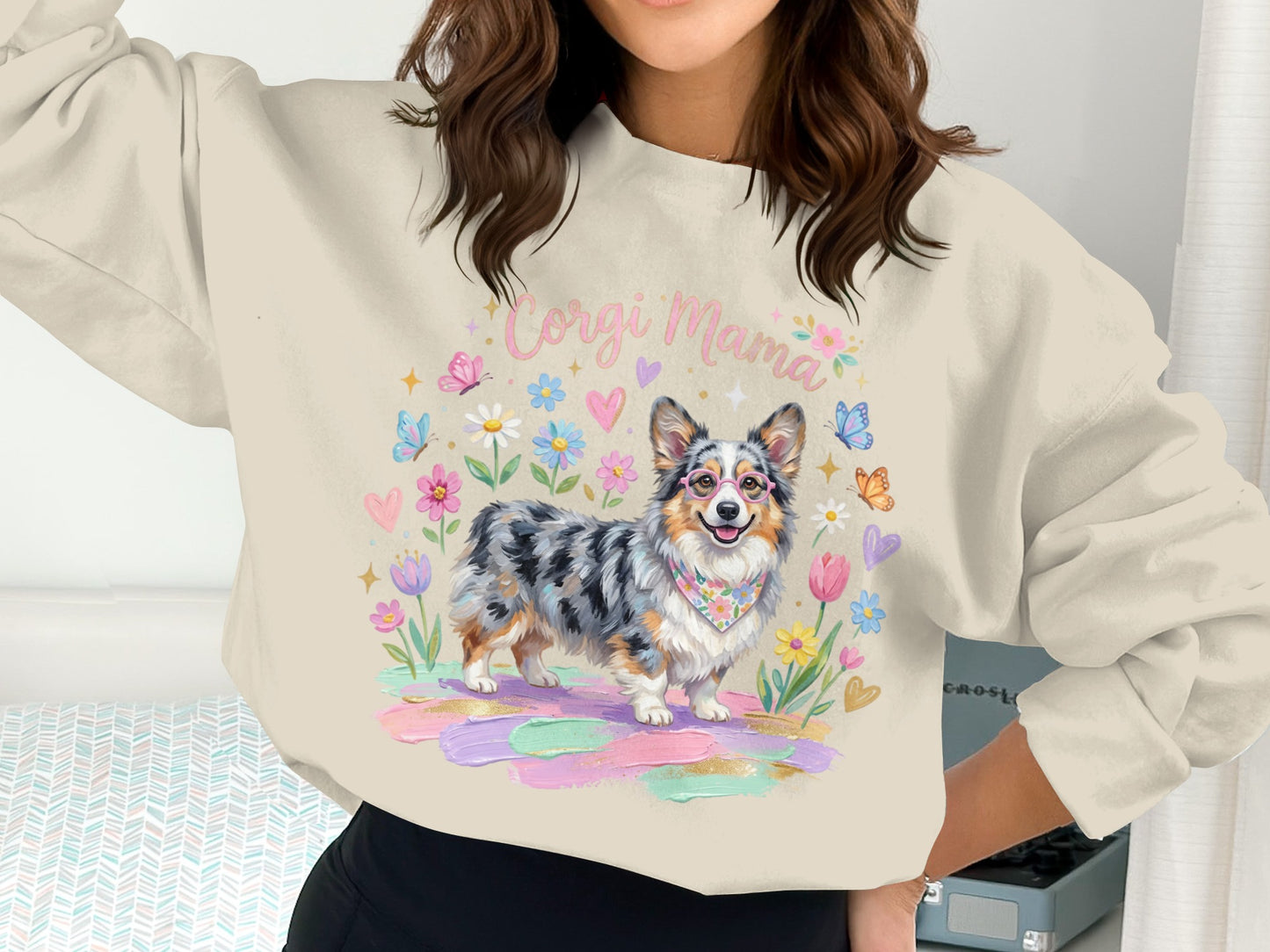 Corgi Mama sweatshirt with a watercolor corgi illustration and floral accents.