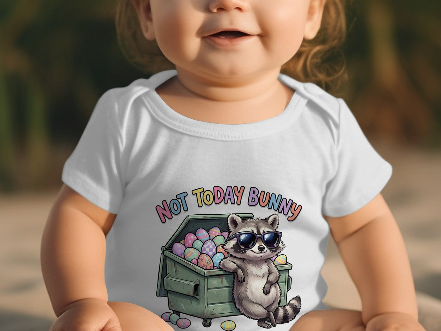Baby wearing white bodysuit with "Not Today Bunny" and raccoon by dumpster.