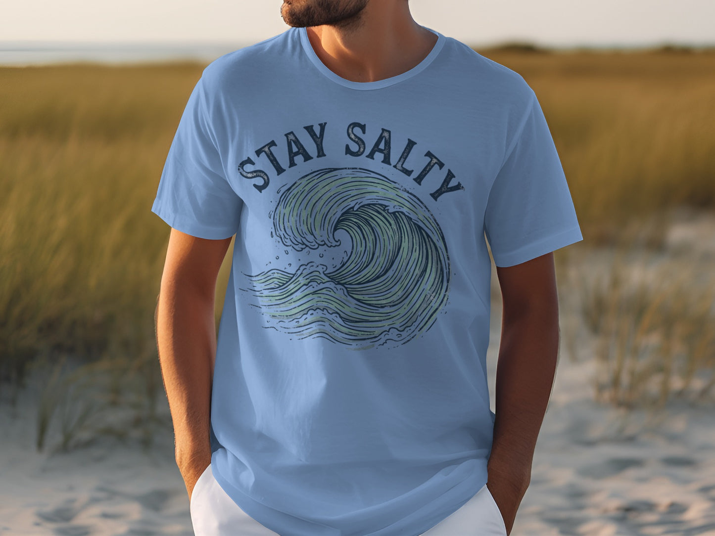 Light blue t-shirt with "Stay Salty" and a wave graphic.