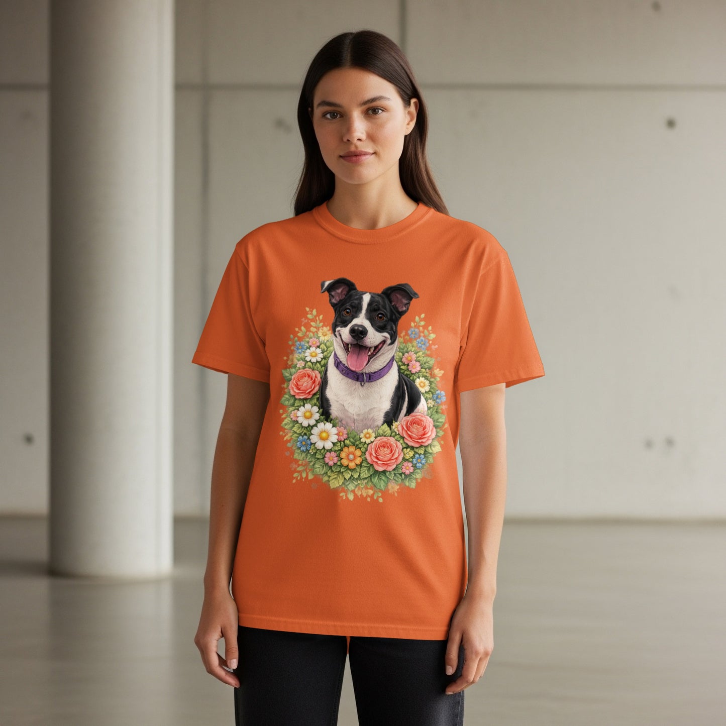 Orange t-shirt with a portrait of a dog in a floral wreath.
