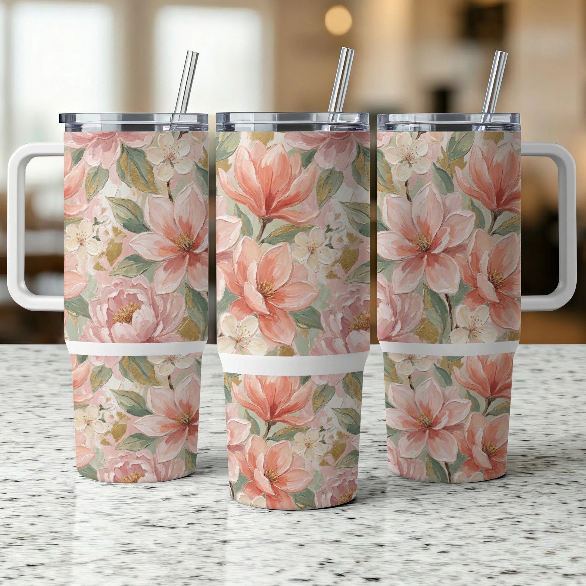 Three tumblers with a floral pattern of pink and white flowers.