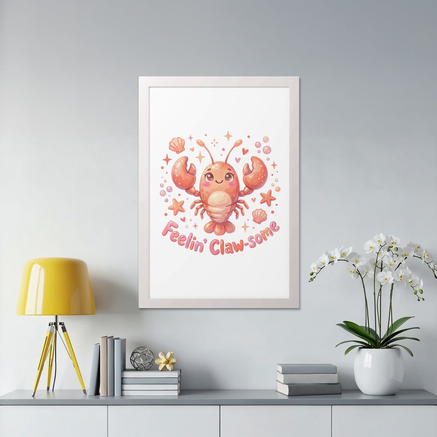 Cute cartoon lobster with "Feelin' Claw-some" text, framed art.