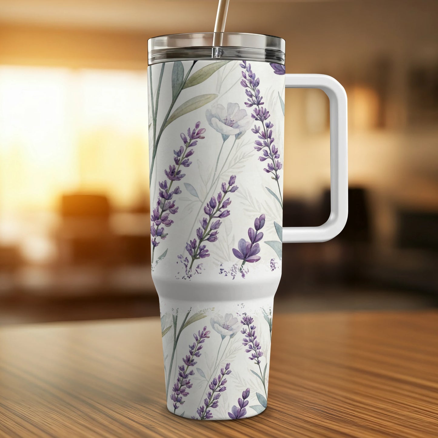 White tumbler with a lavender floral pattern and a straw.