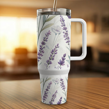 White tumbler with a lavender floral pattern and a straw.