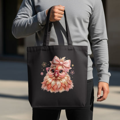 Black tote bag with pink glasses-wearing chick illustration and bow.