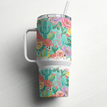 Tumbler with floral and cactus pattern, featuring a straw.