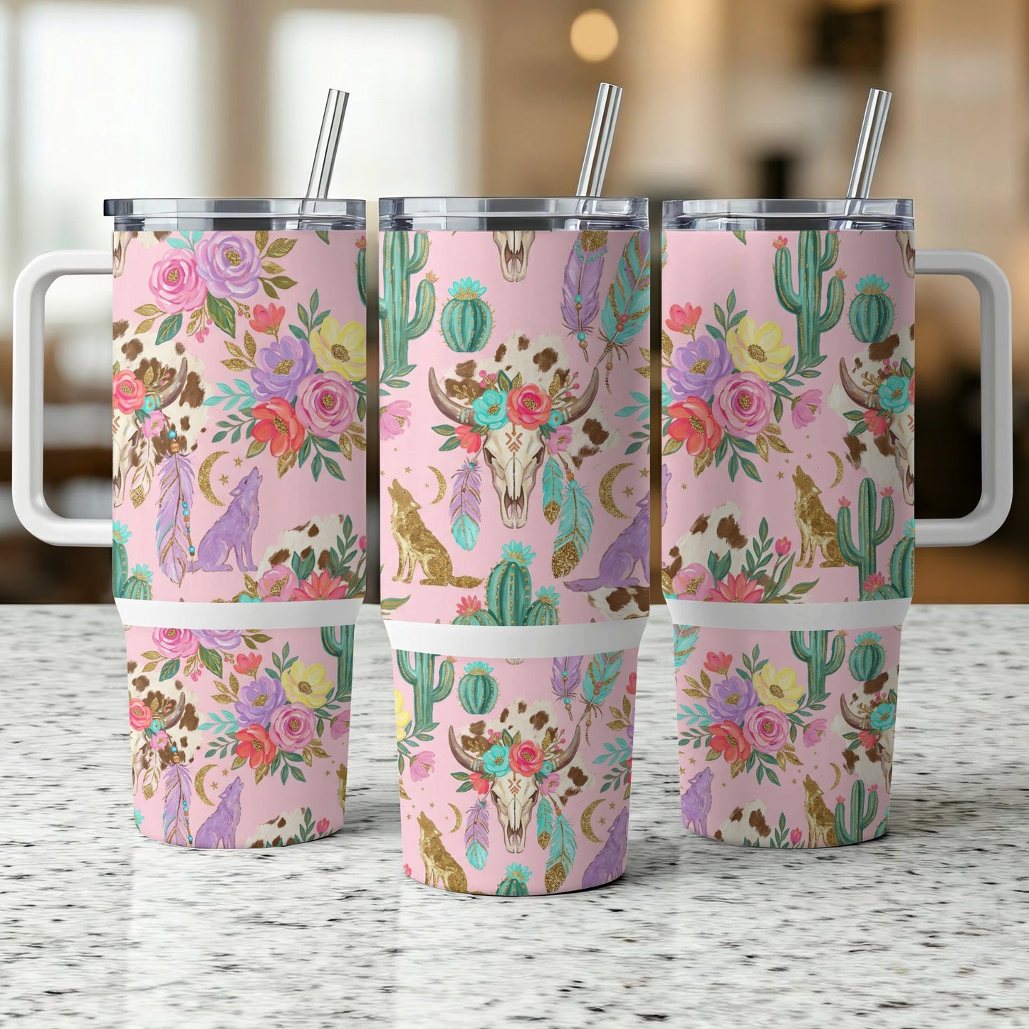 Pink floral tumblers with cow skull, wolf, and cactus design.
