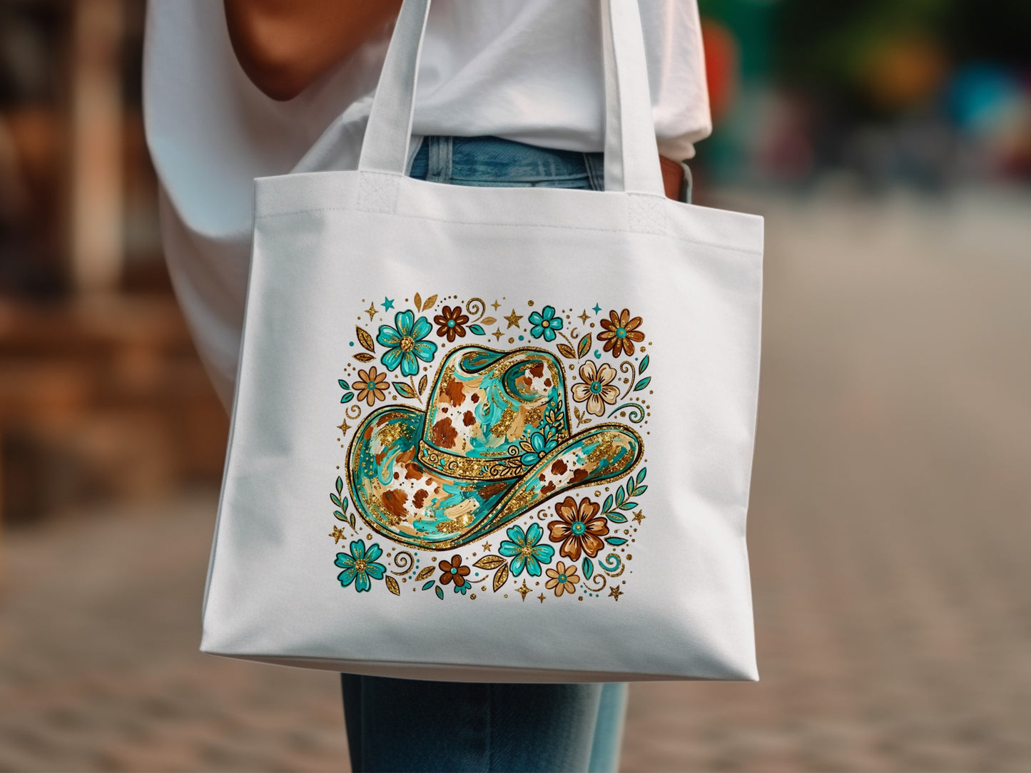 White tote bag with a colorful cowboy hat design.