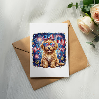 Golden doodle wearing sunglasses with American flags sits in front of fireworks.