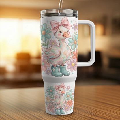 Cute cartoon duck with flowers and bow on a white tumbler.