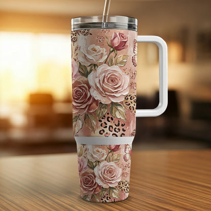 Floral and leopard print tumbler with handle and straw.