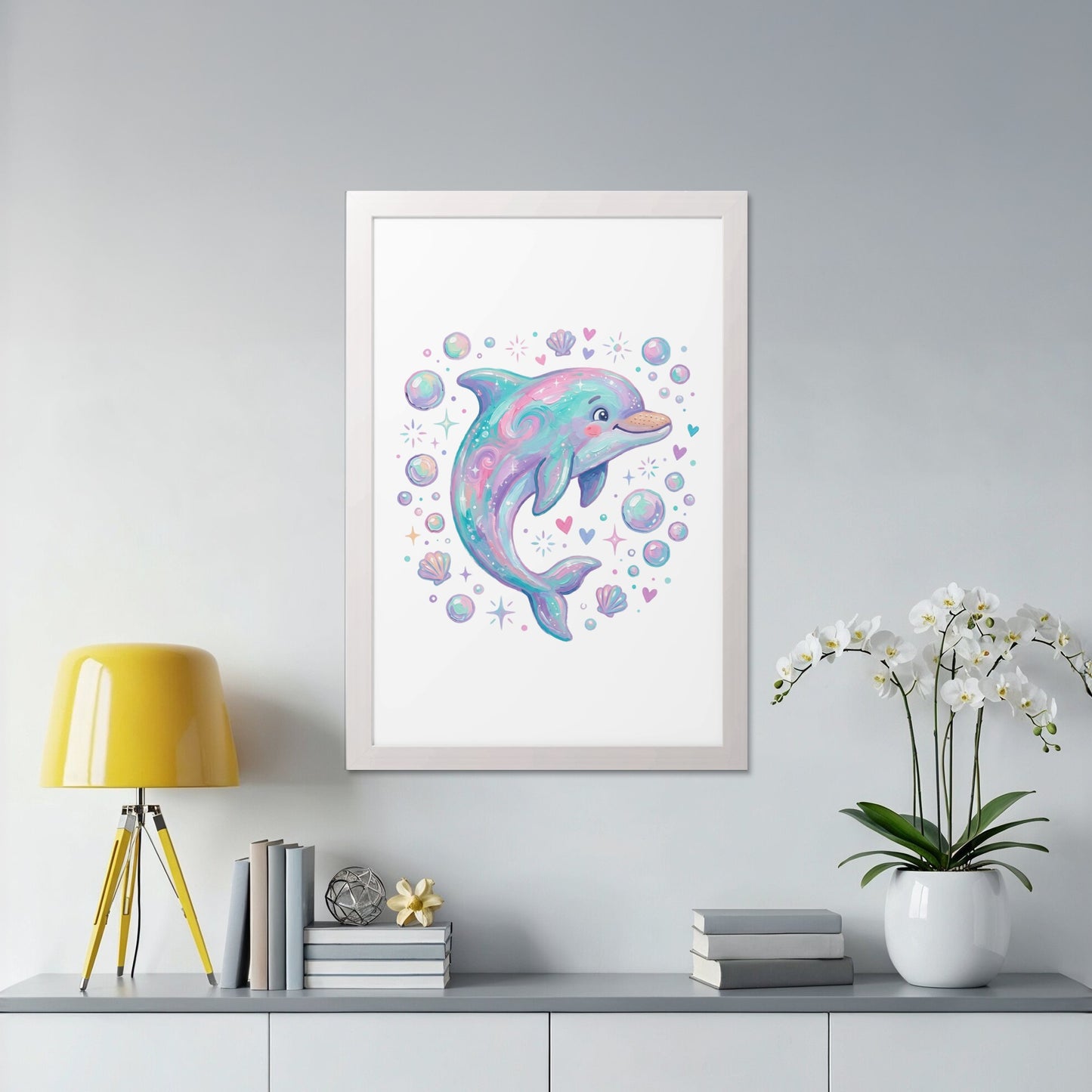 Whimsical pink and blue dolphin surrounded by bubbles and shells in a framed print.