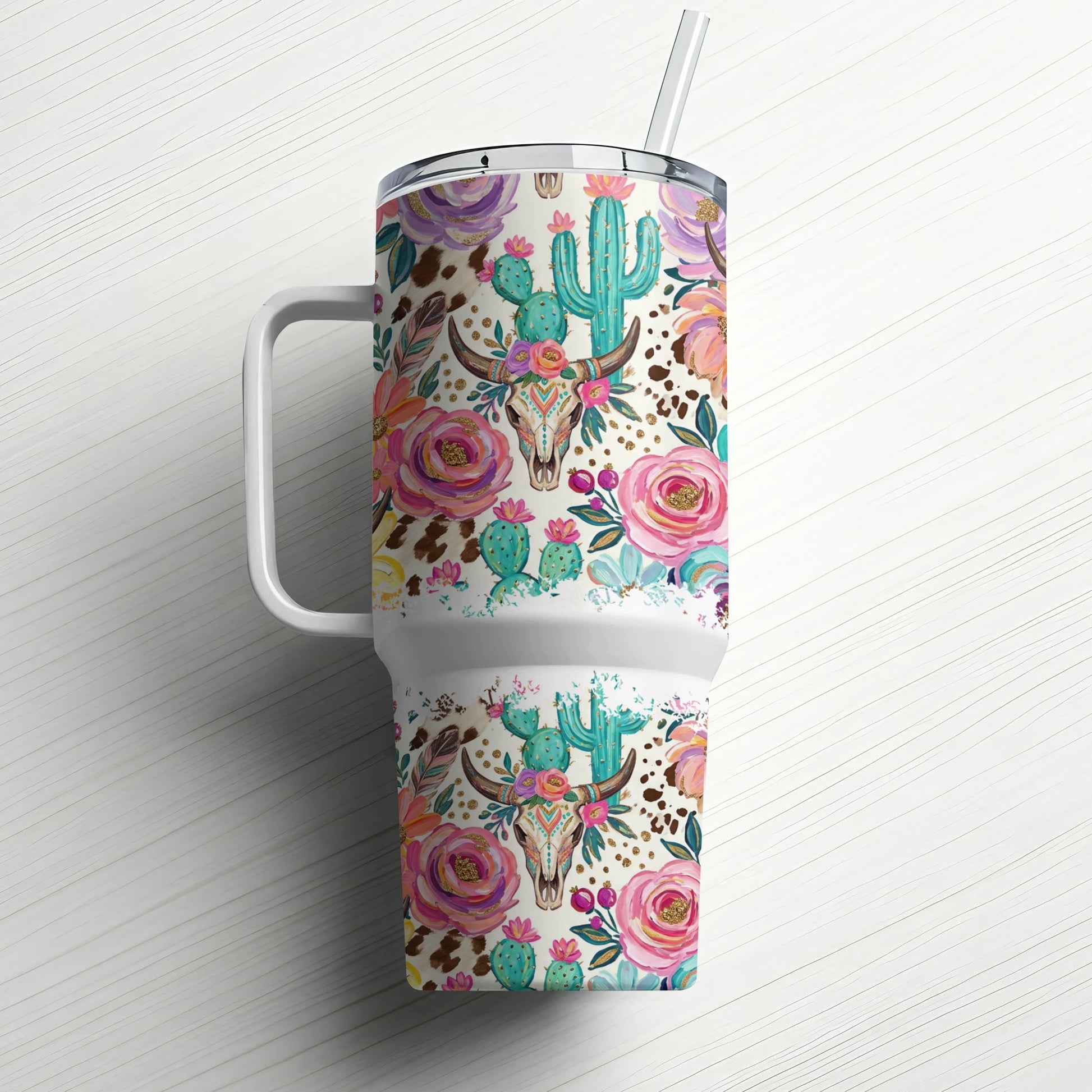 Floral skull and cactus tumbler with handle and straw.