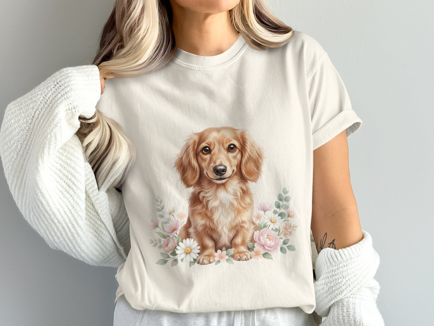 Cream t-shirt with a dachshund and floral illustration.