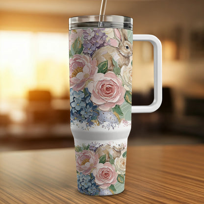 Easter bunny and flowers on a travel mug with handle.
