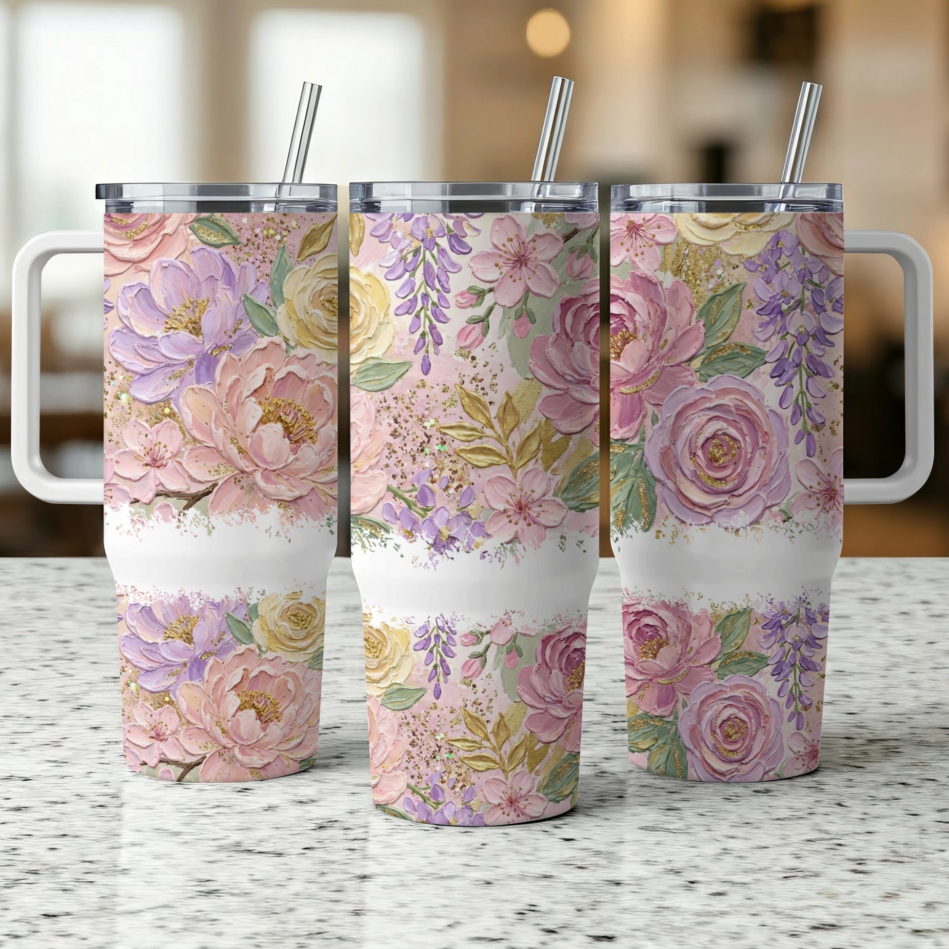Three tumblers with floral patterns and rose gold glitter.