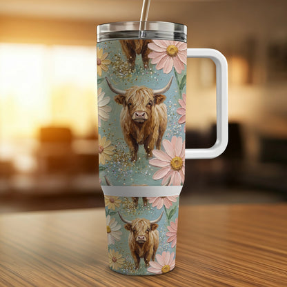 Highland cow with daisies on a patterned tumbler with a white handle.