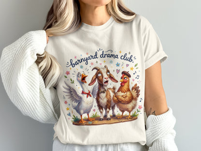 Barnyard Drama Club text over cartoon goose, goat, and chicken on wooden plank.