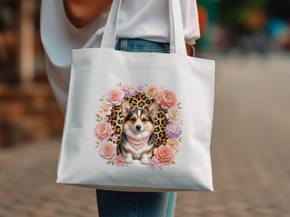 White tote bag with corgi graphic surrounded by flowers and leopard print.