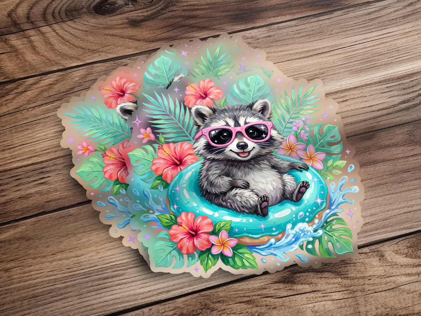 Raccoon wearing pink sunglasses floats on a blue inner tube surrounded by tropical leaves and flowers.