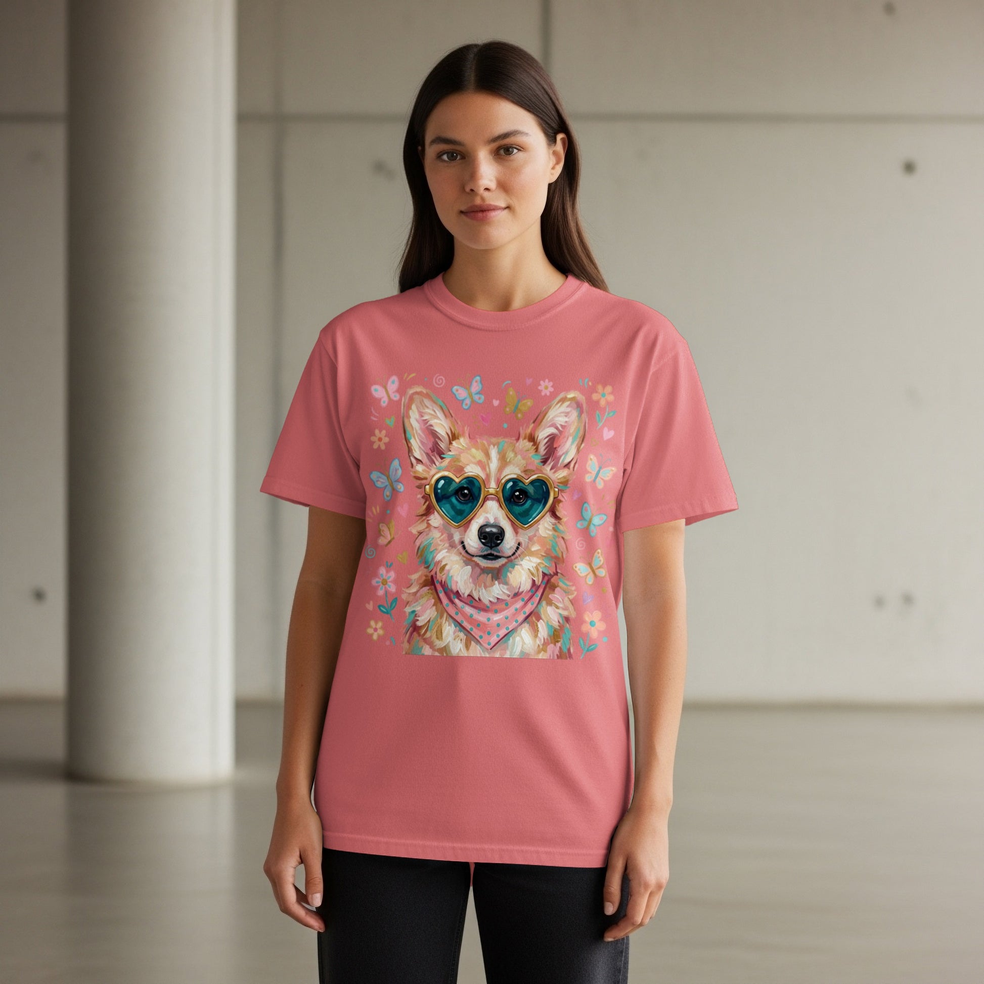 Coral t-shirt with a corgi wearing heart sunglasses and a bandana.
