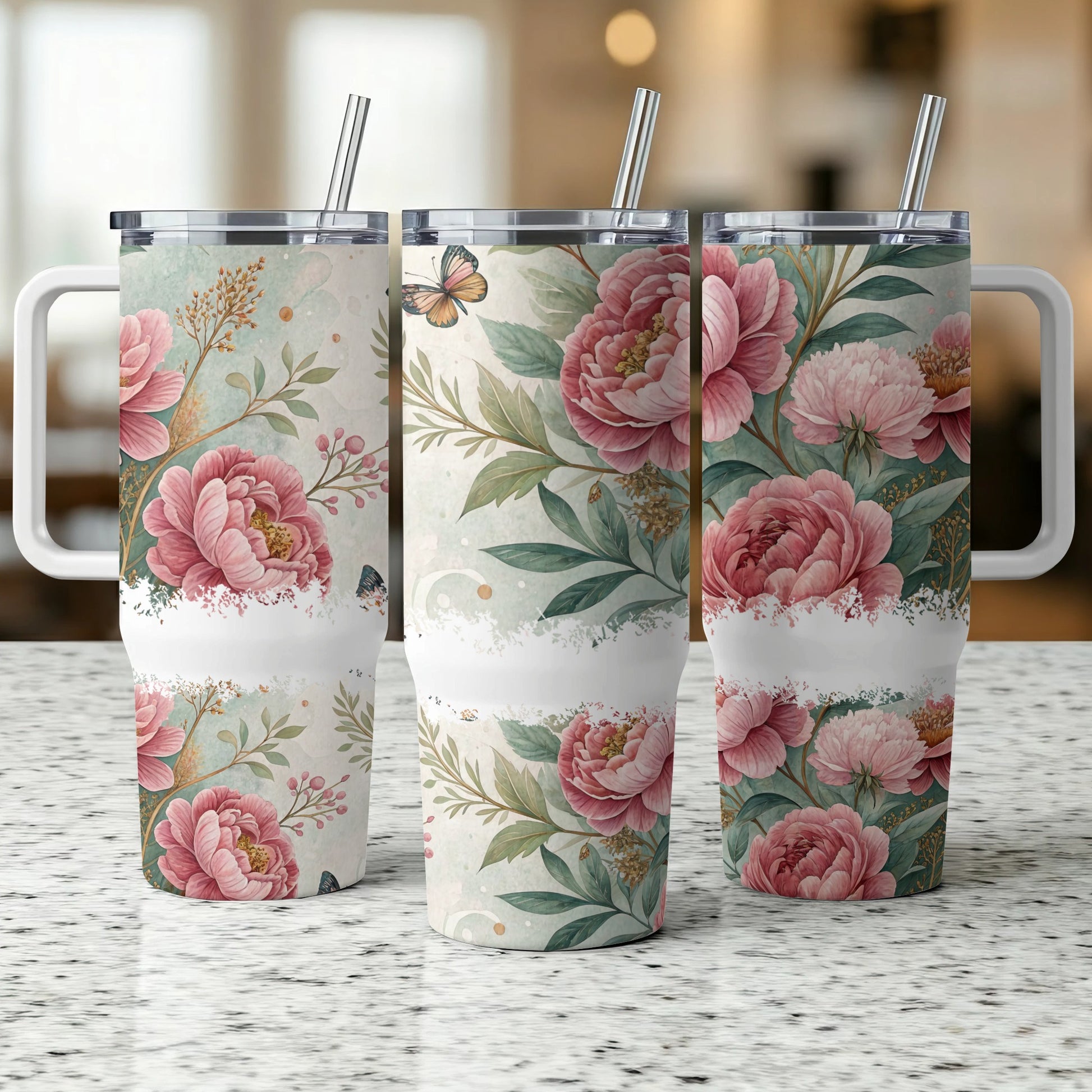 Three tumblers with floral patterns and butterfly accents.