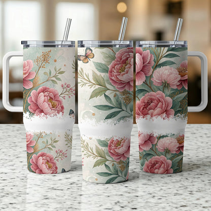 Three tumblers with floral patterns and butterfly accents.