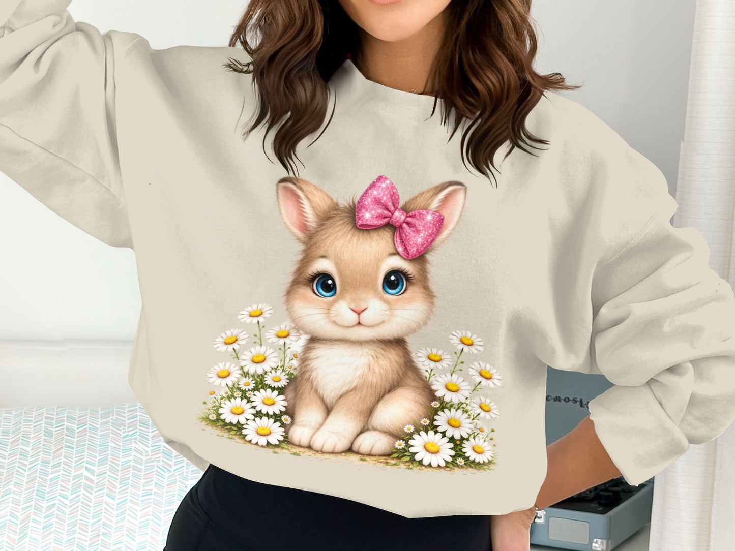 Illustration of a fluffy bunny with big blue eyes wearing a pink bow, surrounded by daisies.