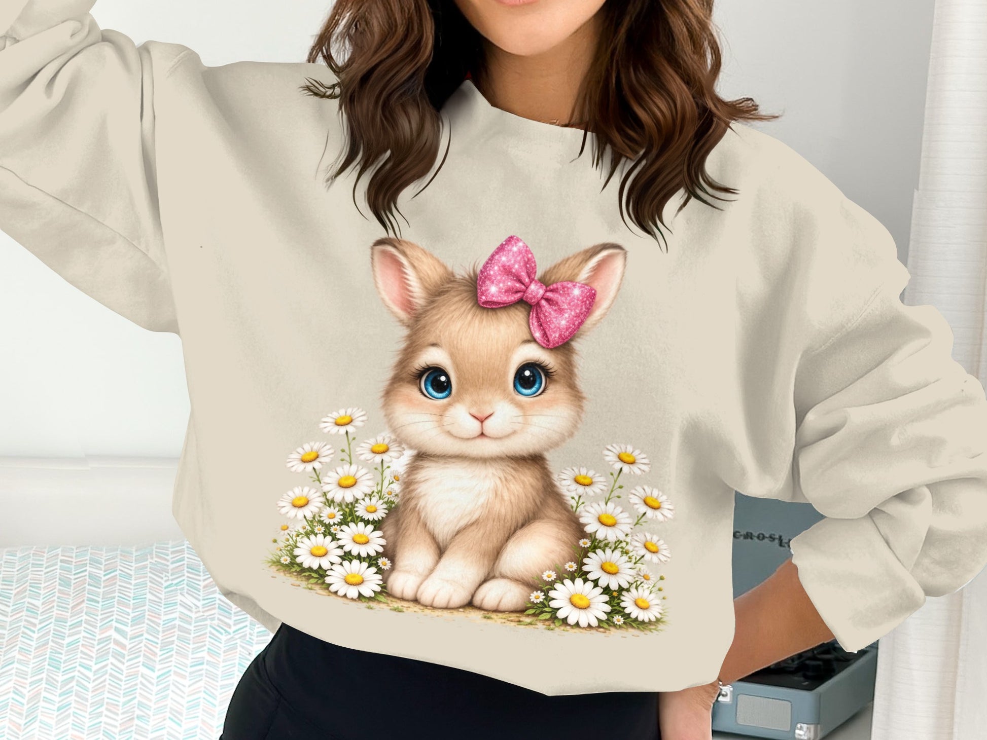 Illustration of a fluffy bunny with big blue eyes wearing a pink bow, surrounded by daisies.
