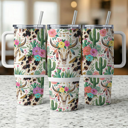 Three tumblers with cow skull, cactus, and floral pattern.