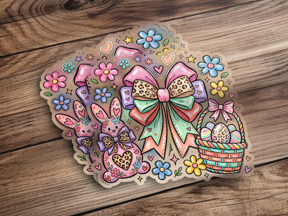 Easter stickers featuring bunnies, a basket of eggs, bows, and flowers on a wooden background.