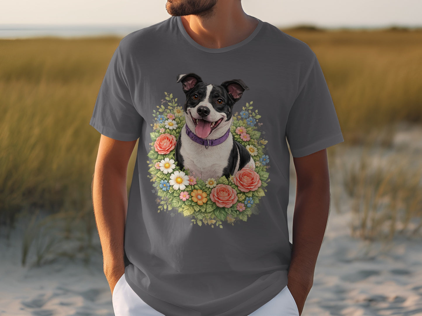 Man wearing a gray t-shirt with a dog in a floral wreath.