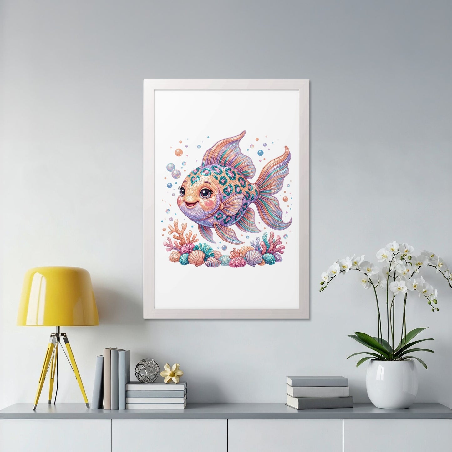 Colorful cartoon goldfish with coral and bubbles in a white frame.