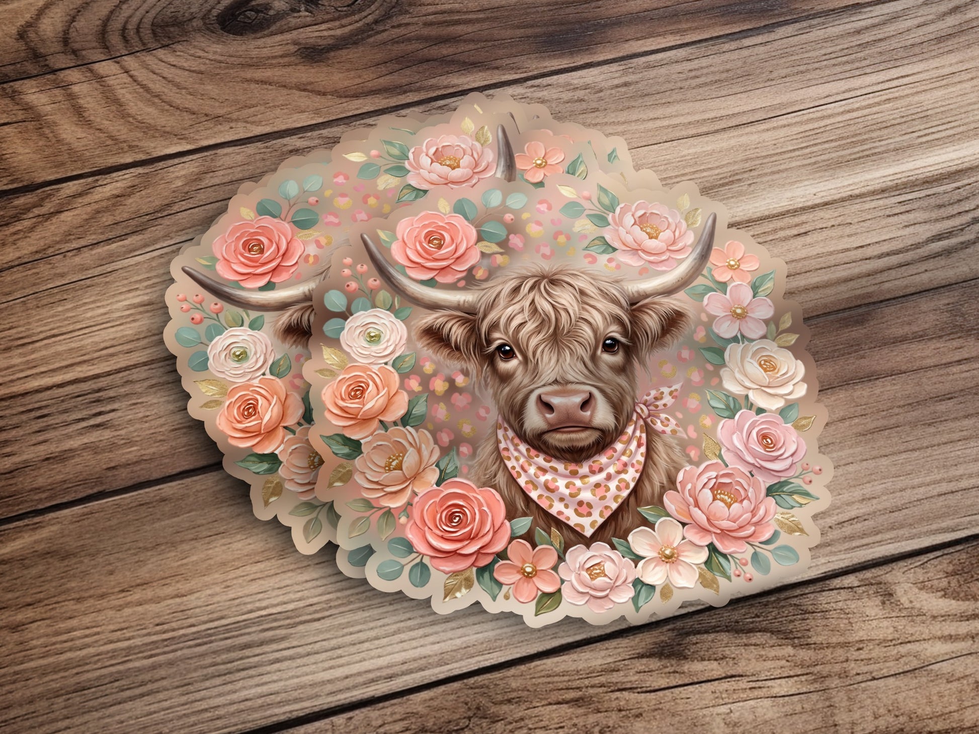Highland cow with floral wreath and bandana on wooden background.