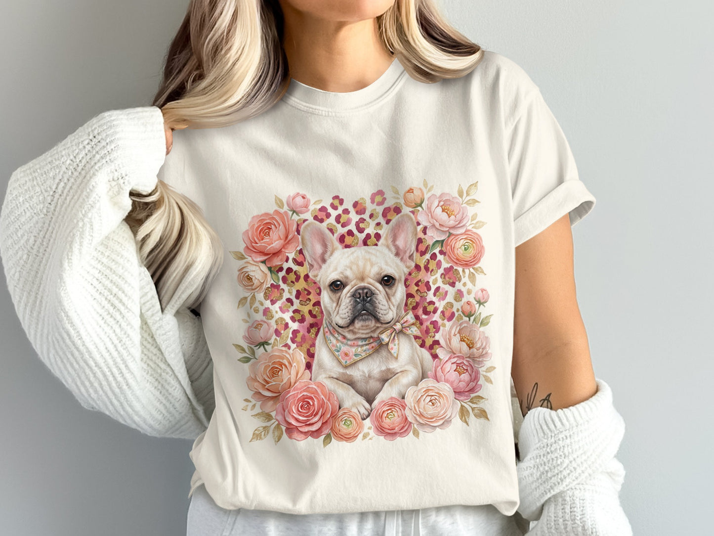 French bulldog wearing bandana surrounded by pink roses and leopard print.