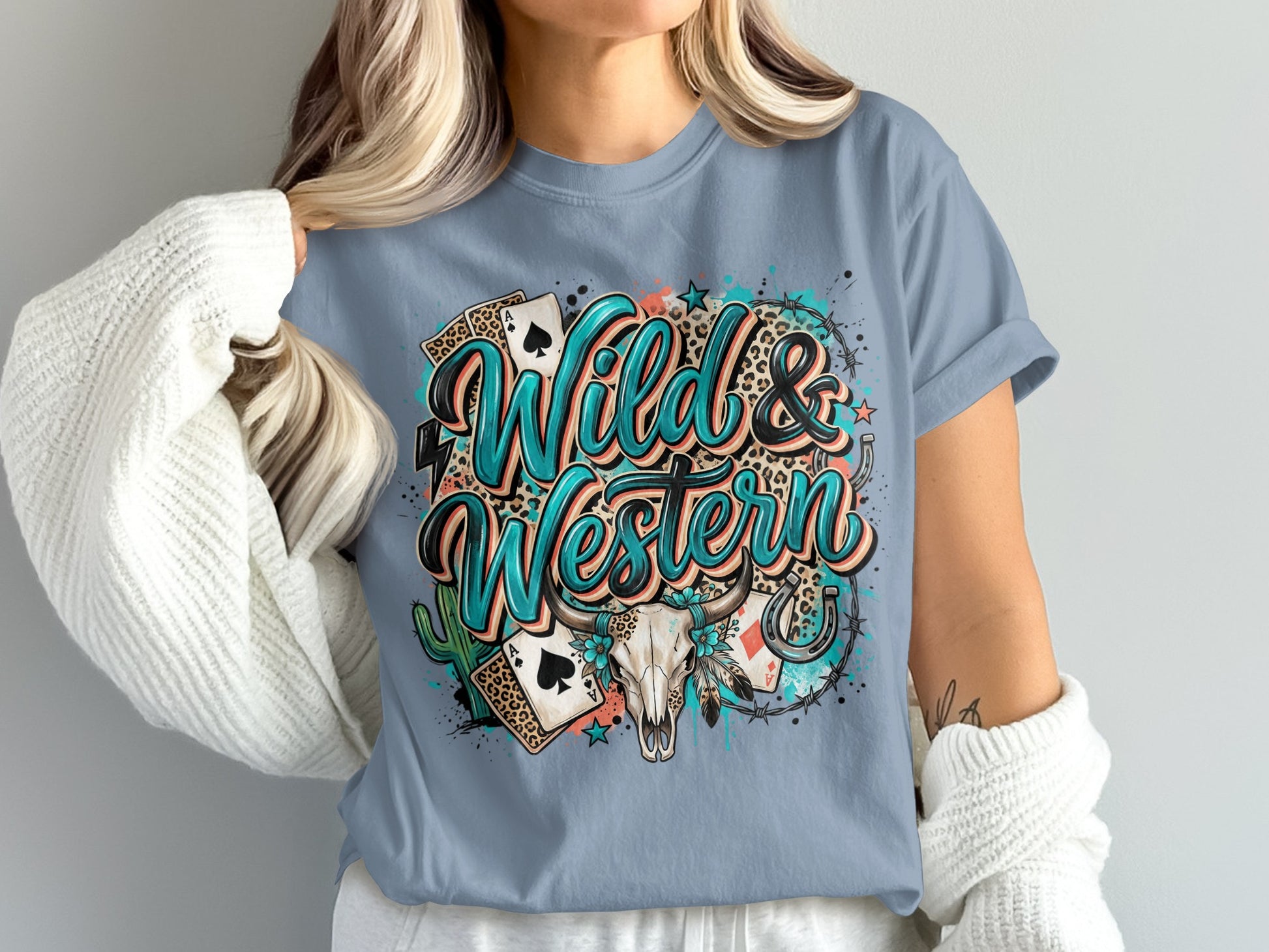 "Wild & Western" text with skull, cards, horseshoe, and leopard print.