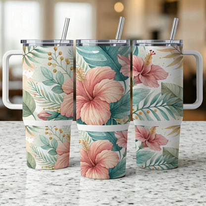 Three tumblers with hibiscus flowers and tropical leaves pattern.