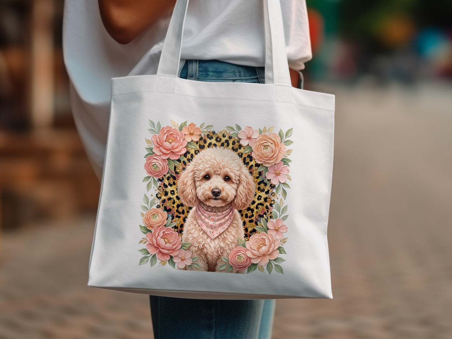 White canvas tote bag featuring a poodle illustration surrounded by floral accents.
