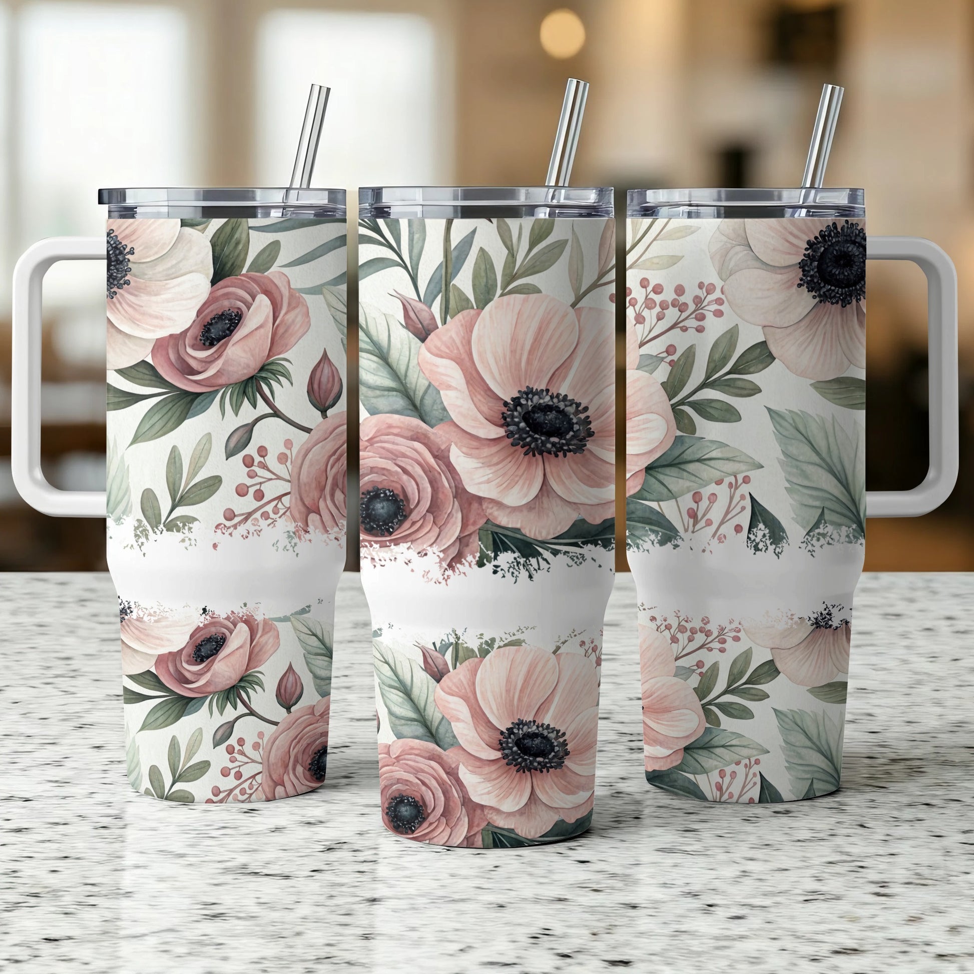 Three floral tumblers with handles and straws, featuring pink and white anemone flowers.
