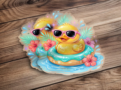 Smiling rubber duck wearing sunglasses floats in a pool.