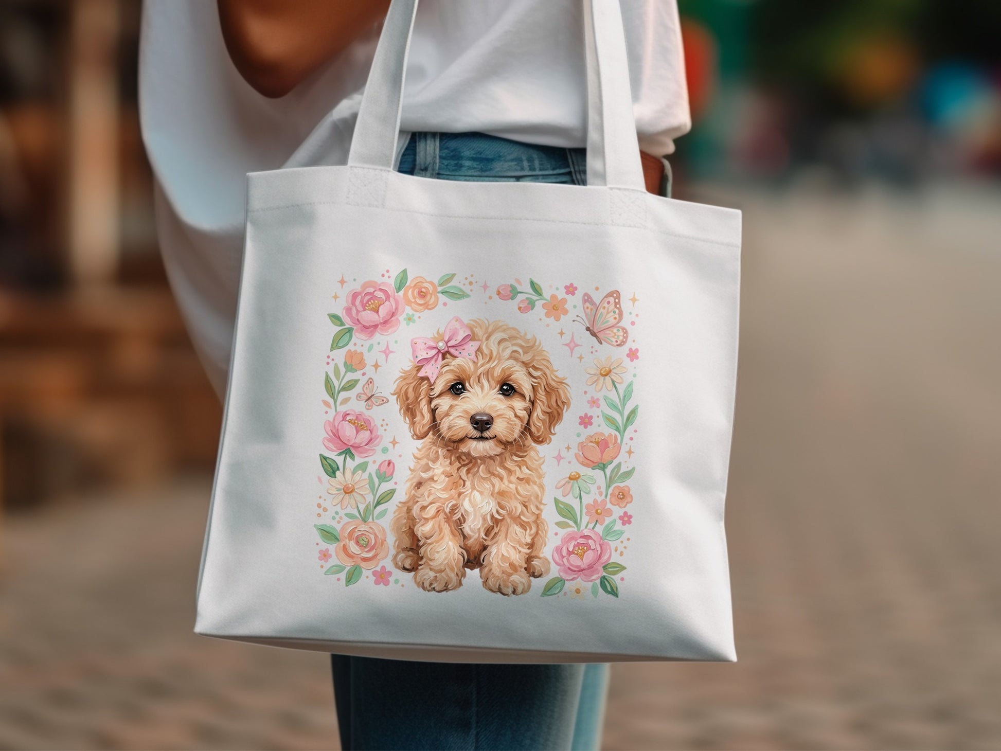 White tote bag with a cute puppy, flowers, and butterflies design.
