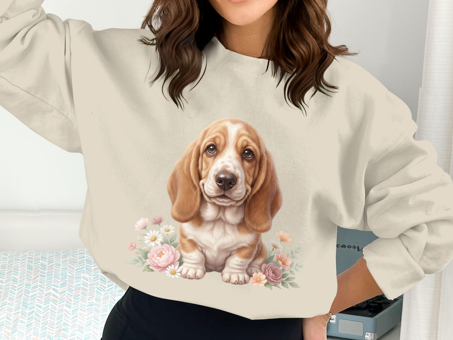 Cream sweatshirt with a watercolor painting of a Basset Hound puppy and flowers.
