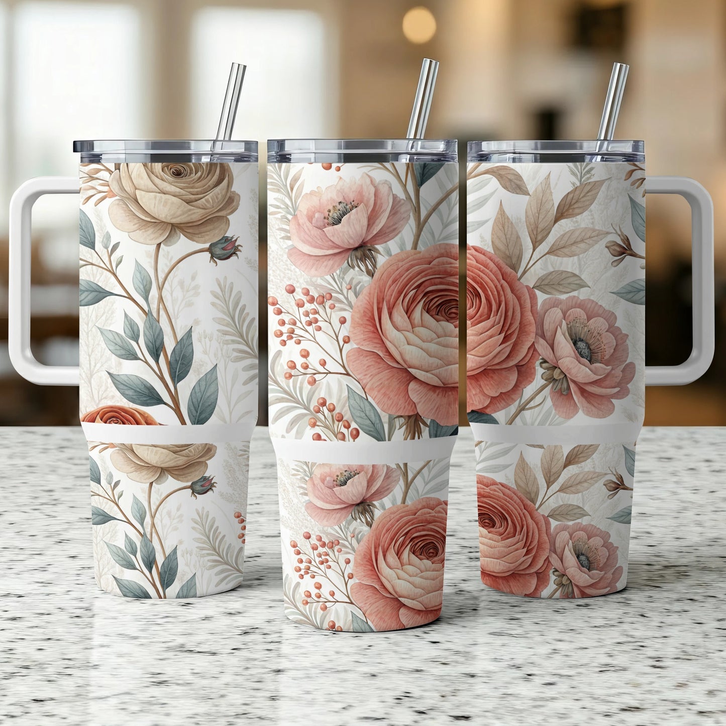 Three tumblers with a floral design featuring roses and leaves.