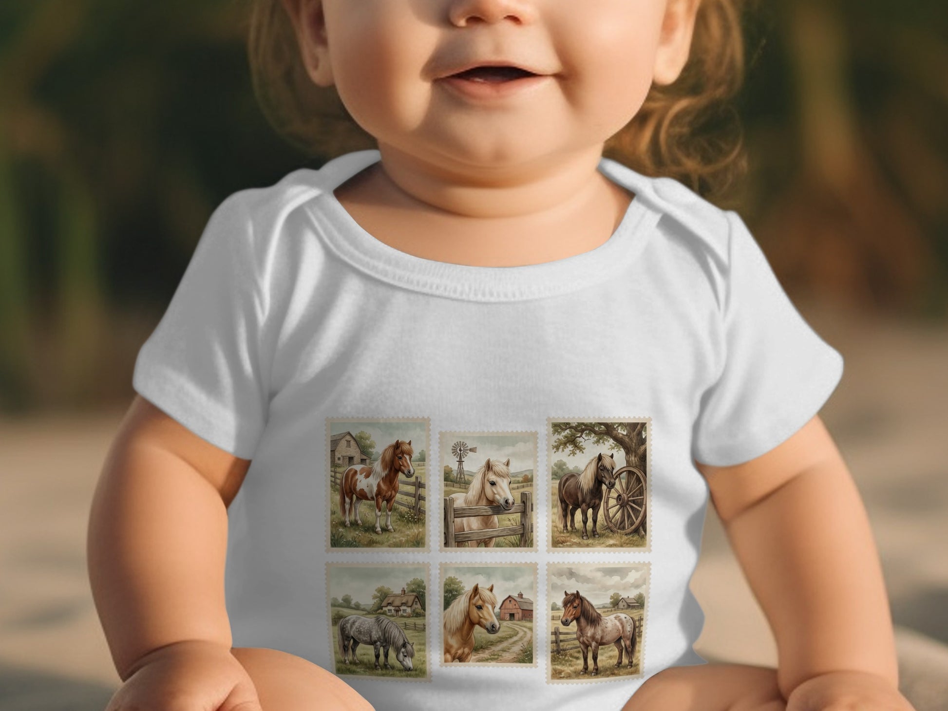Baby in white onesie with postage stamp-like horse illustrations.